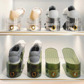 Minimalist modern shoe rack, double-layer adjustable shoe storage, suitable for home and dormitory use. Layered plastic shoe holders.