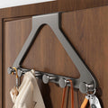 No-drill, heavy-duty triangular clothes hanger for bedroom and bathroom storage, adhesive wall-mounted clothes hooks.