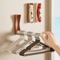 Clothes hanger storage artifact without drilling holes for home balcony clothes drying rack storage